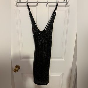 Sequin black dress.